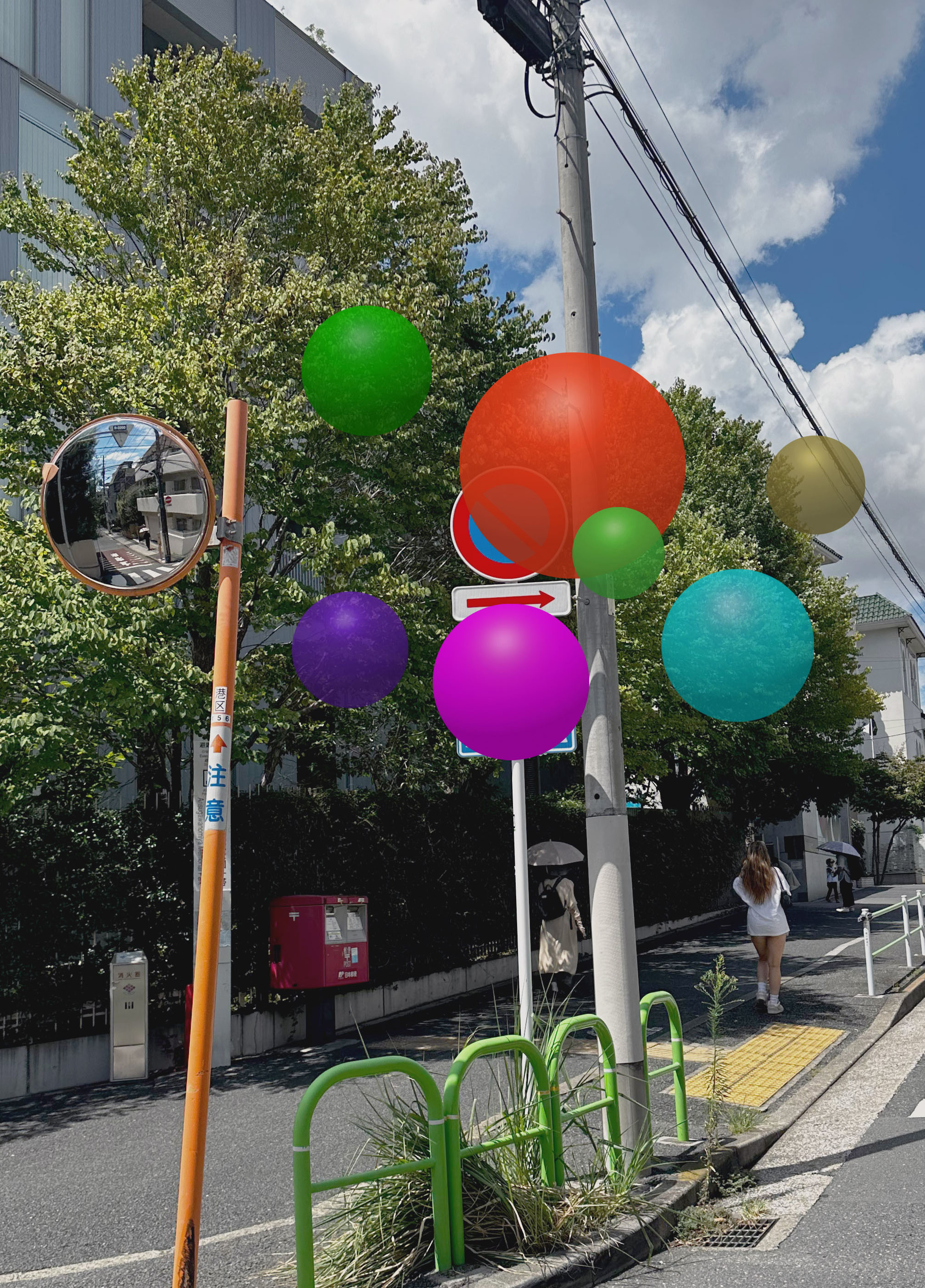 ORB 拡張現実彫刻が東京の横断歩道標識の上に浮かんでいる